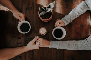 Make time for your relationship holding hands over coffee